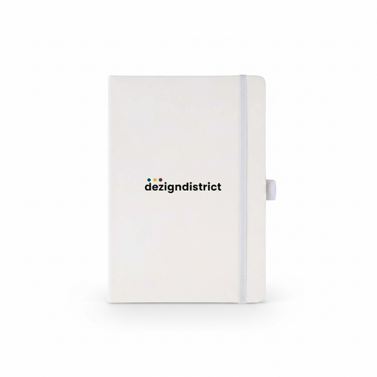 White notebook with dezigndistrict logo