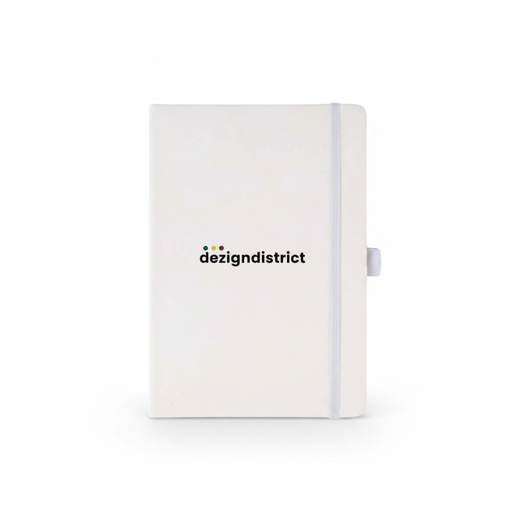 White notebook with dezigndistrict logo